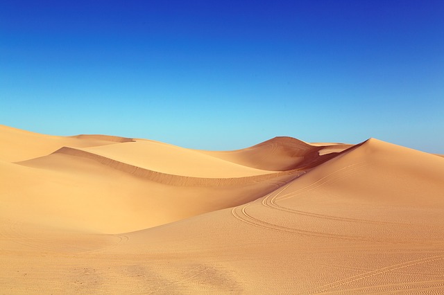 Sand Dunes picture which makes me wonder if sand can melt ice