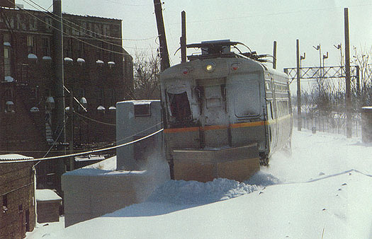 L Electric Car Snow Plowing